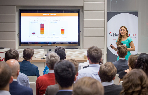 Janthana Kaenprakhamroy presenting to an audience during an early insurtech talk
