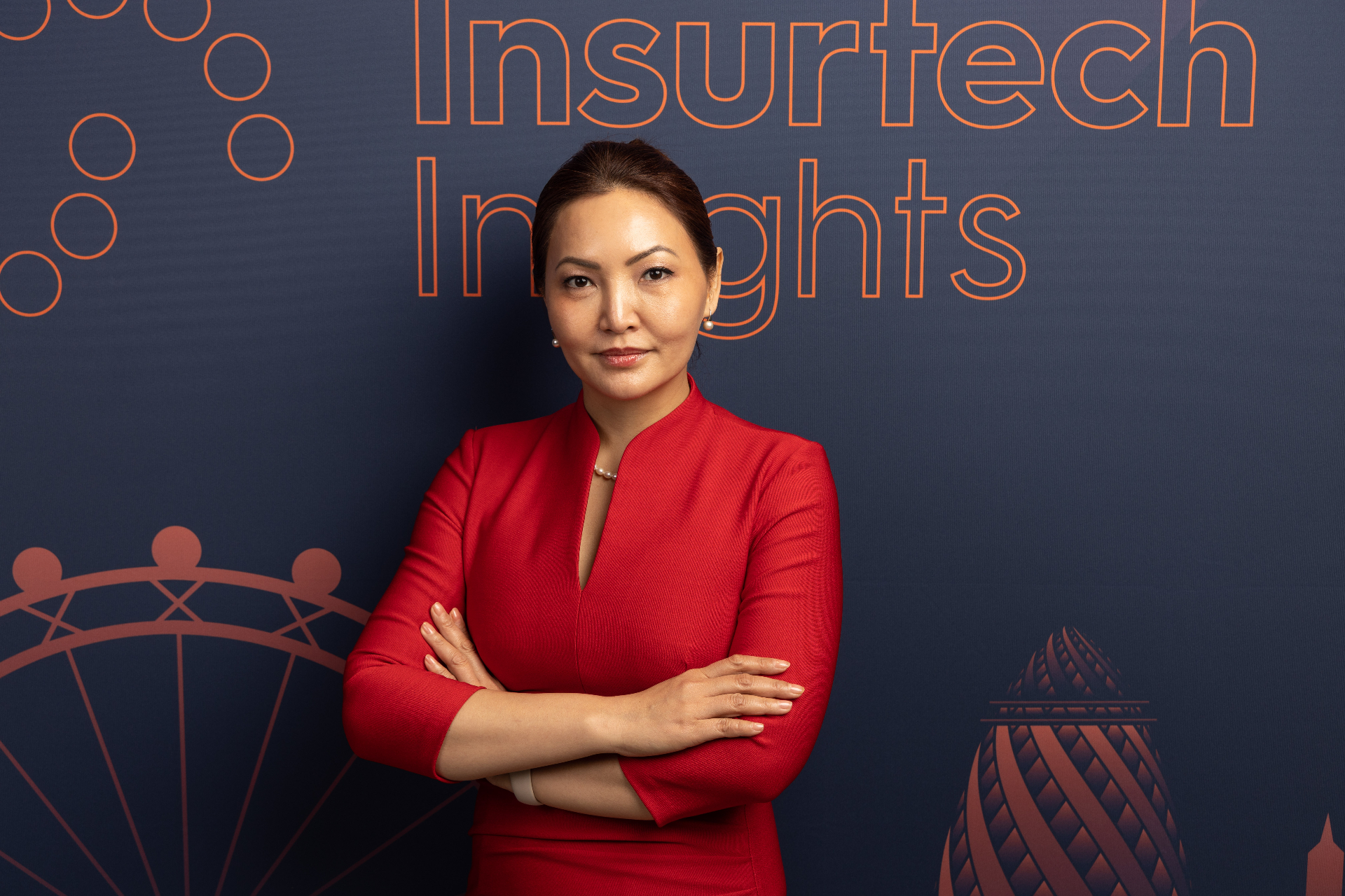 Janthana Kaenprakhamroy at Insurtech Insights in a red dress